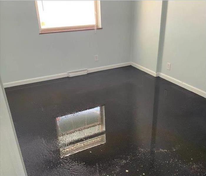 standing water on carpet, wet carpet, water damage in a home